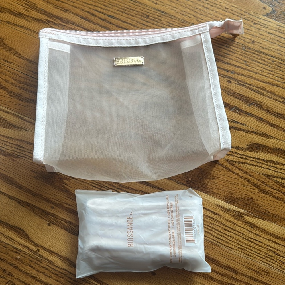 New Biossance headband and mesh makeup bag